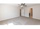 Spacious bedroom with carpet flooring, two closets, and doorways to an en-suite bathroom and the hallway at 213 Clement Ave, Oxford, NC 27565