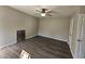 Bright bedroom featuring modern flooring and a ceiling fan at 216 Edgecombe Dr, Spring Lake, NC 28390