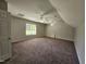 Spacious carpeted bedroom with bright window and two ceiling fans at 216 Edgecombe Dr, Spring Lake, NC 28390