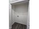 Spacious closet with shelving, washer, and dryer hookups at 216 Edgecombe Dr, Spring Lake, NC 28390