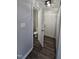 Hallway leading to a bathroom, front door and closets at 216 Edgecombe Dr, Spring Lake, NC 28390