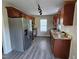 Updated kitchen with stainless steel appliances, granite countertops and wood cabinetry at 216 Edgecombe Dr, Spring Lake, NC 28390