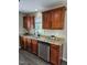 Updated kitchen with granite countertops and stainless steel appliances at 216 Edgecombe Dr, Spring Lake, NC 28390