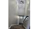 Carpeted stairway with a handrail at 216 Edgecombe Dr, Spring Lake, NC 28390