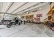 Spacious garage with a truck, motorcycles, work bench and peg board at 216 Tarkenton Ct, Clayton, NC 27527