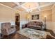 Spacious living room with dark hardwood floors, a decorative rug, and stylish furnishings, creating a cozy atmosphere at 216 Tarkenton Ct, Clayton, NC 27527