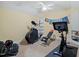 Home exercise room featuring modern fitness equipment and ample open space at 224 Midden Way, Holly Springs, NC 27540