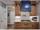 Beautiful kitchen with stainless appliances, custom cabinetry, and modern fixtures at 224 Midden Way, Holly Springs, NC 27540