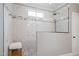 Modern shower featuring sleek glass enclosure and stylish tile accents at 224 Midden Way, Holly Springs, NC 27540