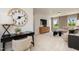 Inviting living room featuring plush seating, stylish decor, and abundant natural light from the large windows at 226 Macon Lake Drive # 41, Apex, NC 27523