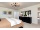 Relaxing main bedroom with neutral tones, offering ample space and a decorative dresser with mirrors at 226 Macon Lake Drive # 41, Apex, NC 27523