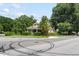 Charming home with a front porch nestled among mature trees and landscaping at 2631 Harvard Ave, Durham, NC 27703