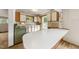 Retro kitchen boasts vintage appliances, ample counter space, and eat in breakfast nook at 2631 Harvard Ave, Durham, NC 27703