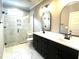 Modern bathroom with double vanity, large shower, and elegant fixtures at 2661 Bowden Dr, Creedmoor, NC 27522