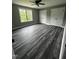 Bright bedroom with hardwood floors, natural light, and closet at 2661 Bowden Dr, Creedmoor, NC 27522