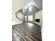 Bright, spacious living room featuring vaulted ceilings, fireplace, and modern flooring at 2661 Bowden Dr, Creedmoor, NC 27522