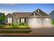 Charming single-Gathering home featuring a two-car garage, tidy landscaping and a welcoming, covered entryway at 3333 Jones Lake Rd, Fuquay Varina, NC 27526
