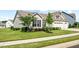 Charming single-Gathering home with a well-kept lawn, mature trees, and a convenient two-car garage at 3333 Jones Lake Rd, Fuquay Varina, NC 27526