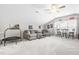 Spacious living room with vaulted ceilings, neutral carpet, and seating arrangement at 3333 Jones Lake Rd, Fuquay Varina, NC 27526