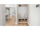 Inviting mudroom featuring a bench with storage baskets underneath and 'Home Sweet Home' pillows at 3333 Jones Lake Rd, Fuquay Varina, NC 27526
