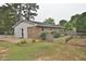 Fenced backyard with a mix of brick, vinyl, and wooded fencing at 3610 Lambert Ln, Rocky Mount, NC 27804