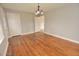 Bright dining room featuring lustrous hardwood flooring and decorative chandelier lighting at 3610 Lambert Ln, Rocky Mount, NC 27804
