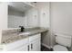 Bathroom featuring granite countertops, modern fixtures, ample lighting and flooring at 404 Shannonford Ct, Wake Forest, NC 27587