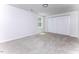 Spacious bedroom with plush carpet, neutral walls, and large closet at 404 Shannonford Ct, Wake Forest, NC 27587