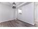 Dining area showcasing modern flooring and a view into the kitchen at 404 Shannonford Ct, Wake Forest, NC 27587
