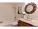 Stylish bathroom featuring classic tile, a vanity with a vessel sink, and modern fixtures at 604 Mills St, Raleigh, NC 27608