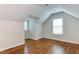 Bedroom featuring hardwood floors, neutral walls, natural light, and recessed lighting at 604 Mills St, Raleigh, NC 27608