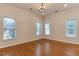 Spacious bedroom featuring hardwood floors, neutral paint, and bright, natural light at 604 Mills St, Raleigh, NC 27608