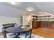An upstairs bonus room contains a game table and built in shelves and cabinets at 604 Mills St, Raleigh, NC 27608