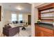 Comfortable living room showcasing neutral decor, built-in shelving, and an inviting seating arrangement at 604 Mills St, Raleigh, NC 27608