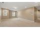 Spacious bedroom with neutral carpet, natural light and en suite bathroom access at 724 Piermont Dr, Cary, NC 27519