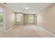 Bright bedroom features neutral walls, plush carpet, and natural light from two windows at 724 Piermont Dr, Cary, NC 27519