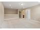 Spacious bonus room with neutral walls and plush carpet, perfect for flexible living space at 724 Piermont Dr, Cary, NC 27519