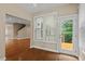 Bright sun room with access to a deck or patio and view of the backyard at 724 Piermont Dr, Cary, NC 27519