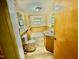 Traditional bathroom featuring a tub/shower combo, and single sink vanity at 747 Buckhorn Rd, Sanford, NC 27330