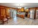 Kitchen with wood cabinets, stainless steel refrigerator, and lots of counter space at 9455 Boston Rd, Roxboro, NC 27574