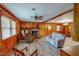 Inviting living room with brick fireplace, lots of windows and comfortable seating at 9455 Boston Rd, Roxboro, NC 27574