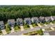 An aerial view of a residential neighborhood, showing manicured lawns and tree-lined streets at 958 Bay Bouquet Ln, Apex, NC 27523