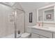 Modern bathroom featuring a glass enclosed shower, and a sleek vanity at 958 Bay Bouquet Ln, Apex, NC 27523