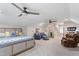 Spacious bedroom featuring ceiling fans, seating area, and comfortable furnishings at 958 Bay Bouquet Ln, Apex, NC 27523