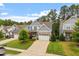 Beautiful two-story home with a well-kept lawn, a two-car garage, and inviting curb appeal at 958 Bay Bouquet Ln, Apex, NC 27523