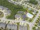 Aerial view of the community, pool, and playground at 100 Beaconwood Ln, Holly Springs, NC 27540