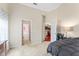 Main bedroom showing ensuite bathroom and dining area access, enhancing the functionality and openness of the layout at 100 Beaconwood Ln, Holly Springs, NC 27540