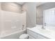 Bright bathroom with a shower and tub combination and a white vanity at 1006 Oxford Ridge Rd, Wake Forest, NC 27587