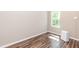 Bedroom featuring a hardwood floor and bright window view at 1006 Oxford Ridge Rd, Wake Forest, NC 27587