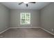 Bedroom featuring plush carpeting, a ceiling fan and natural light at 1006 Oxford Ridge Rd, Wake Forest, NC 27587
